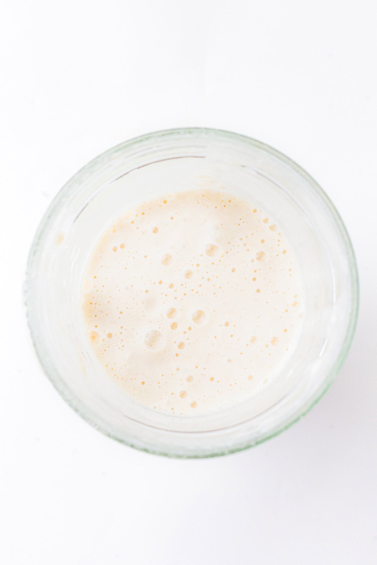 Top view of bubbly active sourdough starter ready for baking