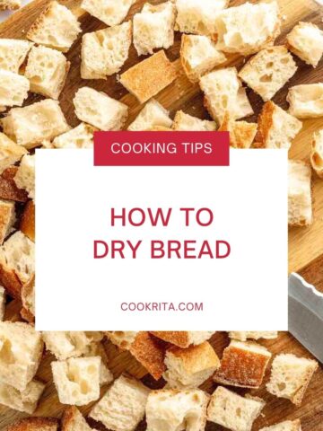 Dried bread cubes on a wooden cutting board with the text “How to Dry Bread.”